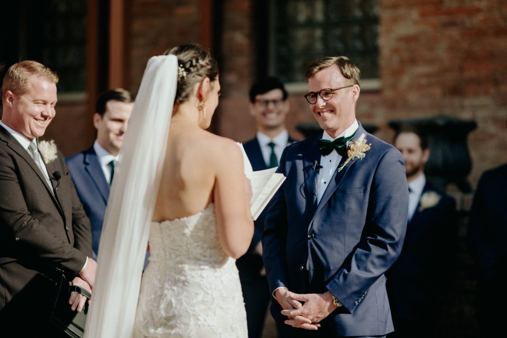 bride and groom share an intimate moment during their wedding ceremony