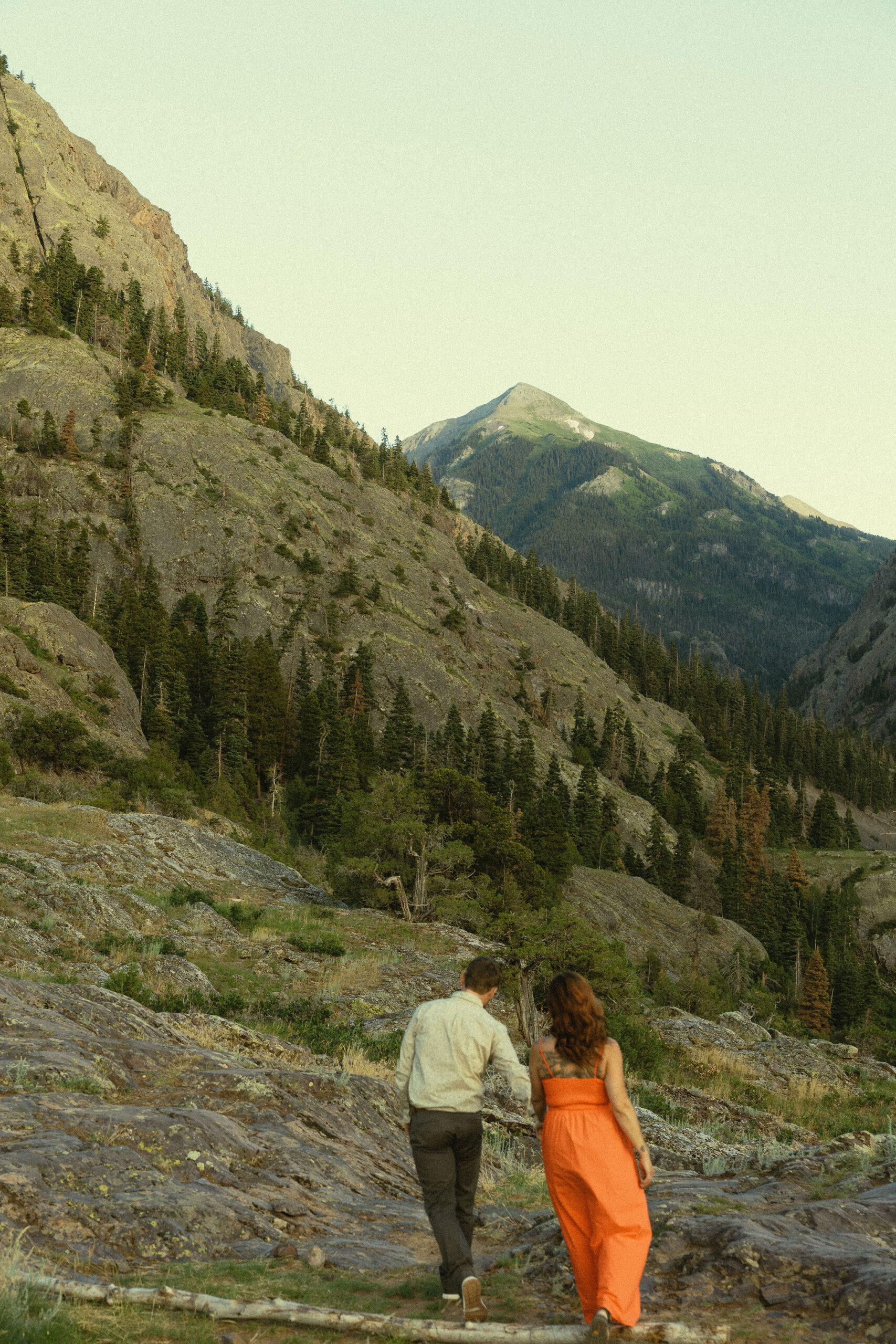 beautiful couple pose with the Rocky mountains outside Ouray, Colorado