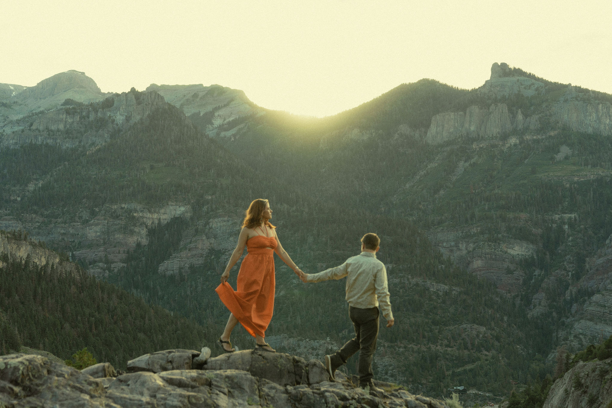 beautiful couple pose with the Rocky mountains outside Ouray, Colorado