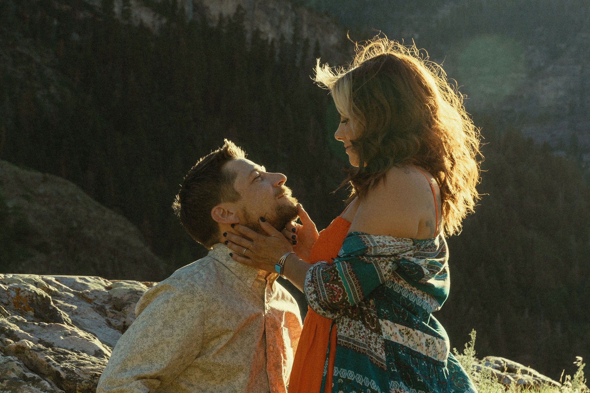 beautiful couple pose with the Rocky mountains outside Ouray, Colorado