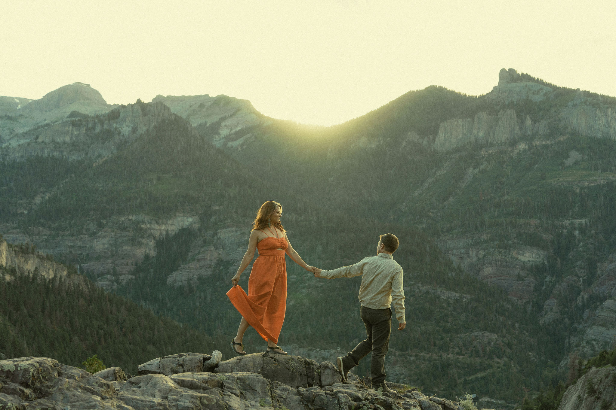 stunning couple pose together in the Colorado mountains