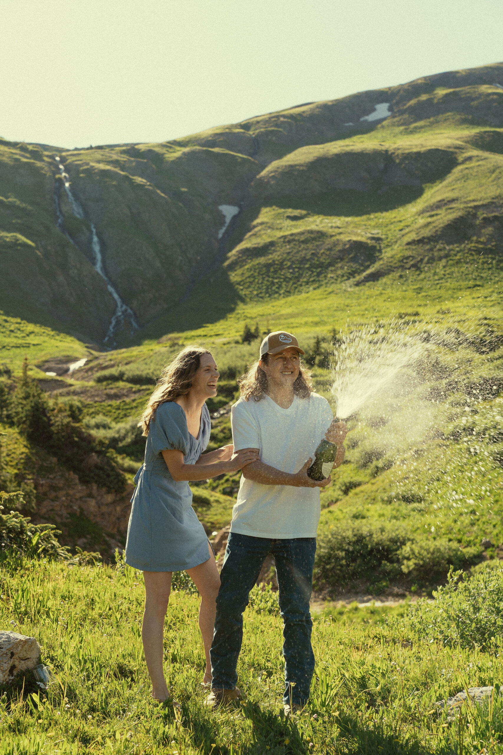 beautiful couple pose together during their Colorado engagement photoshoot