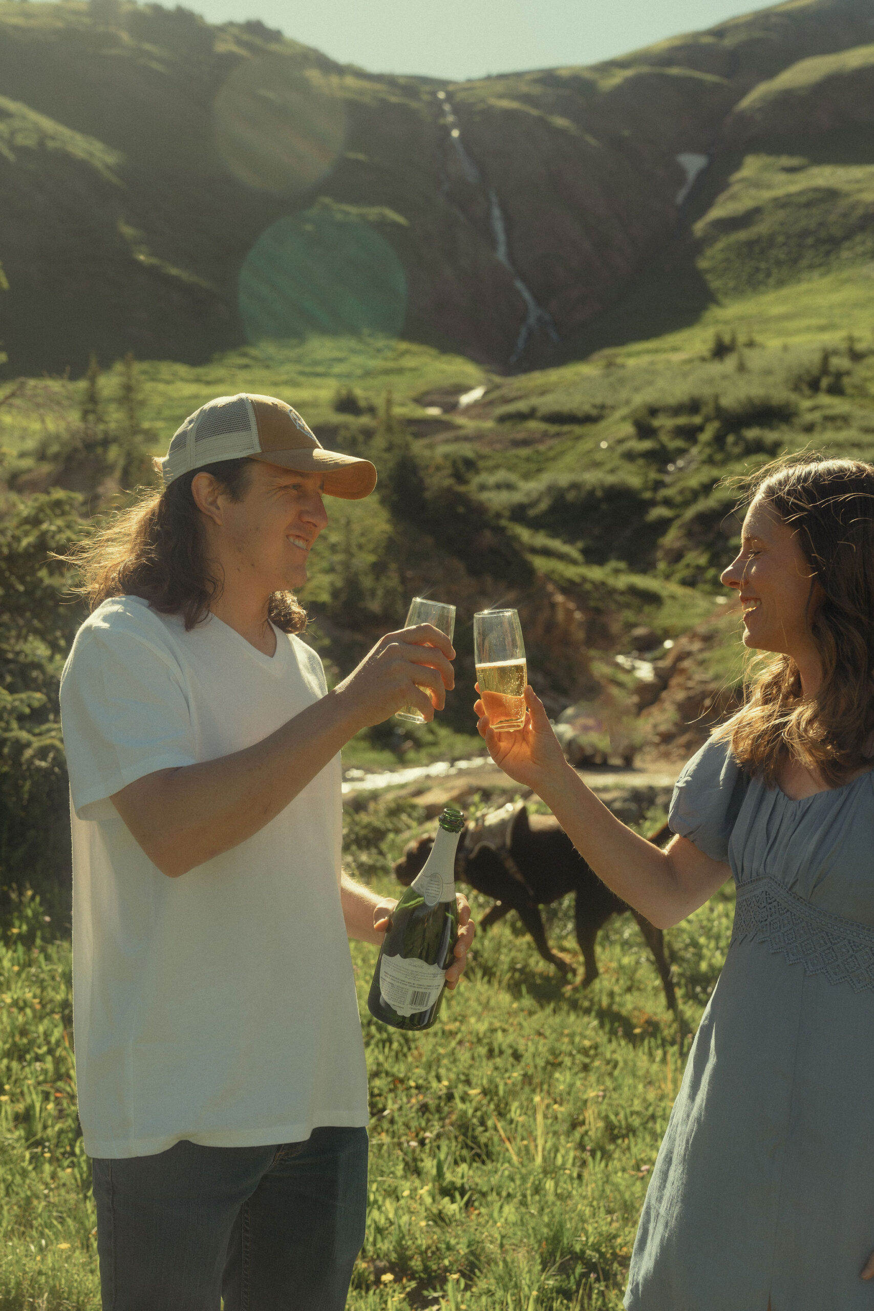 beautiful couple pose together during their Colorado engagement photoshoot