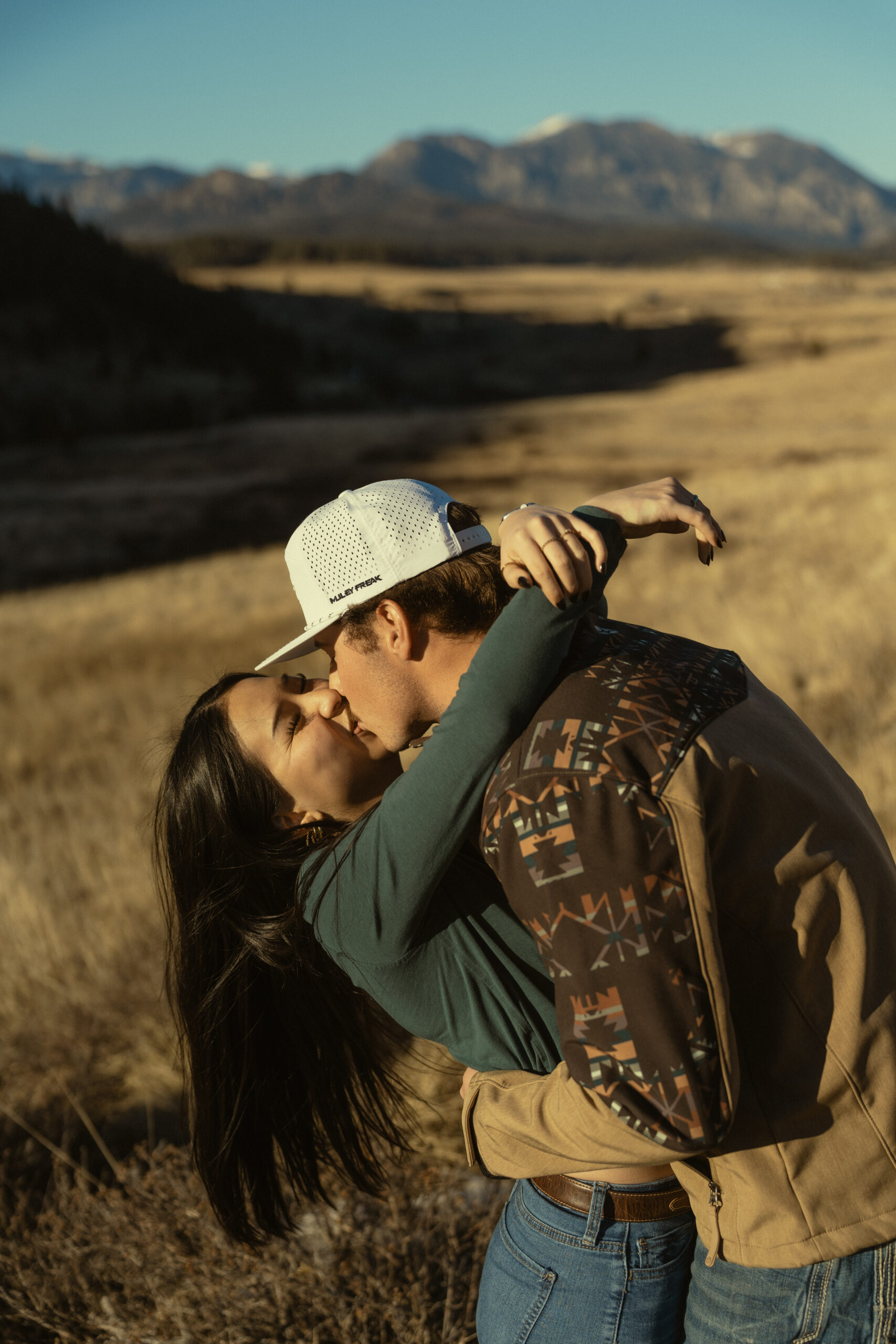 beautiful couple pose for a photo during their Pagosa Springs engagement photo session