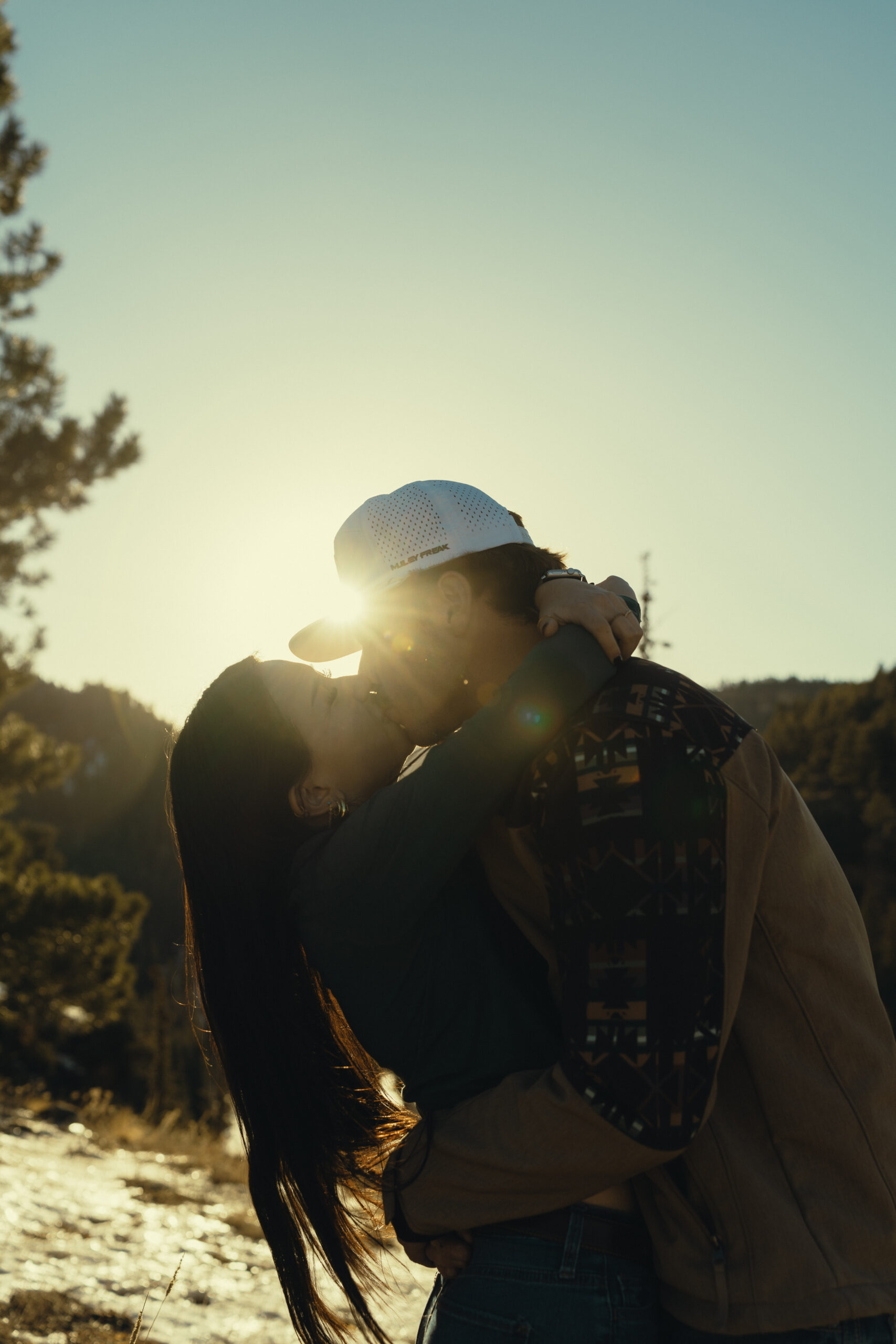 beautiful couple pose for a photo during their Pagosa Springs engagement photo session