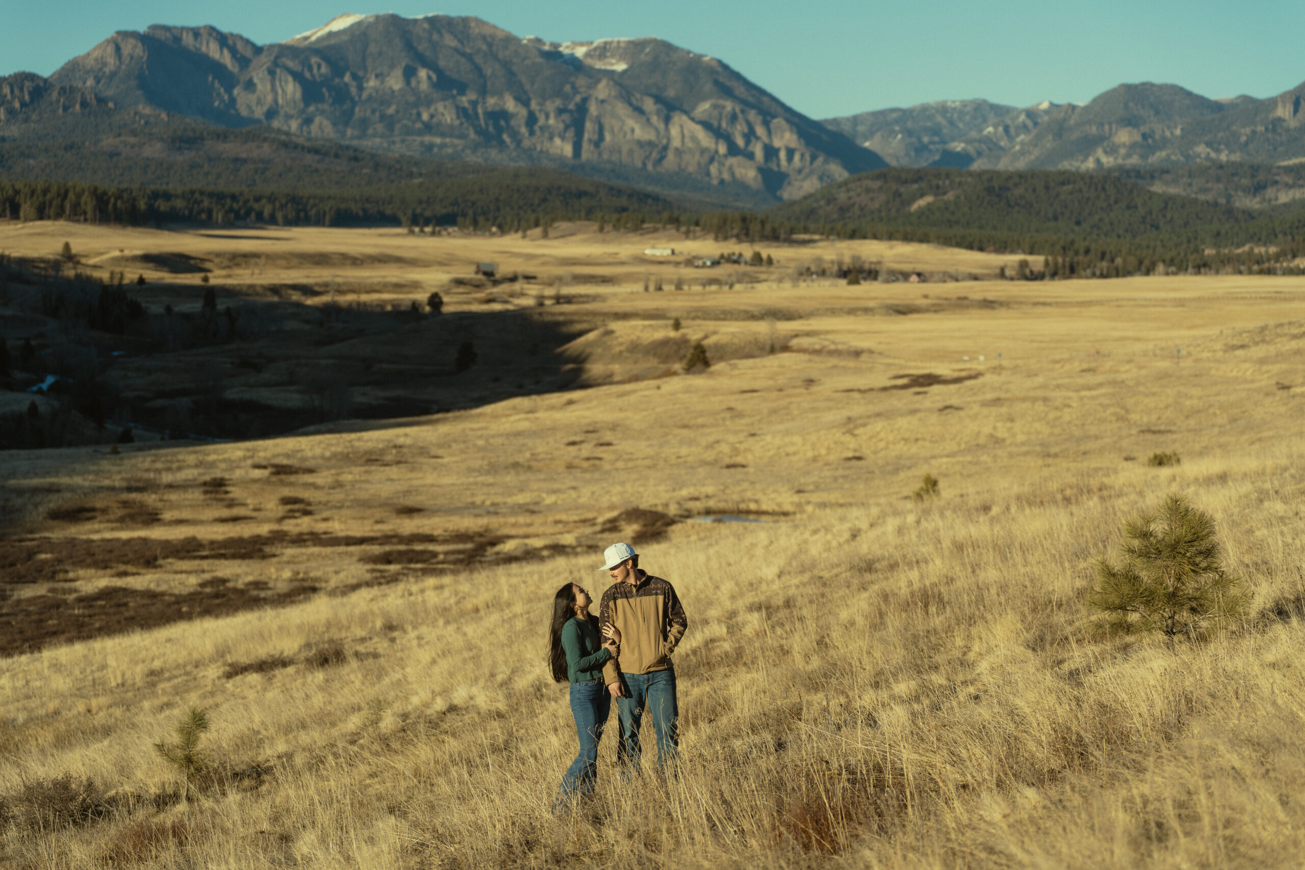 beautiful couple pose for a photo during their Pagosa Springs engagement photo session