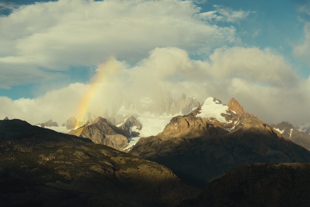 stunning mountains are surrounded by clouds