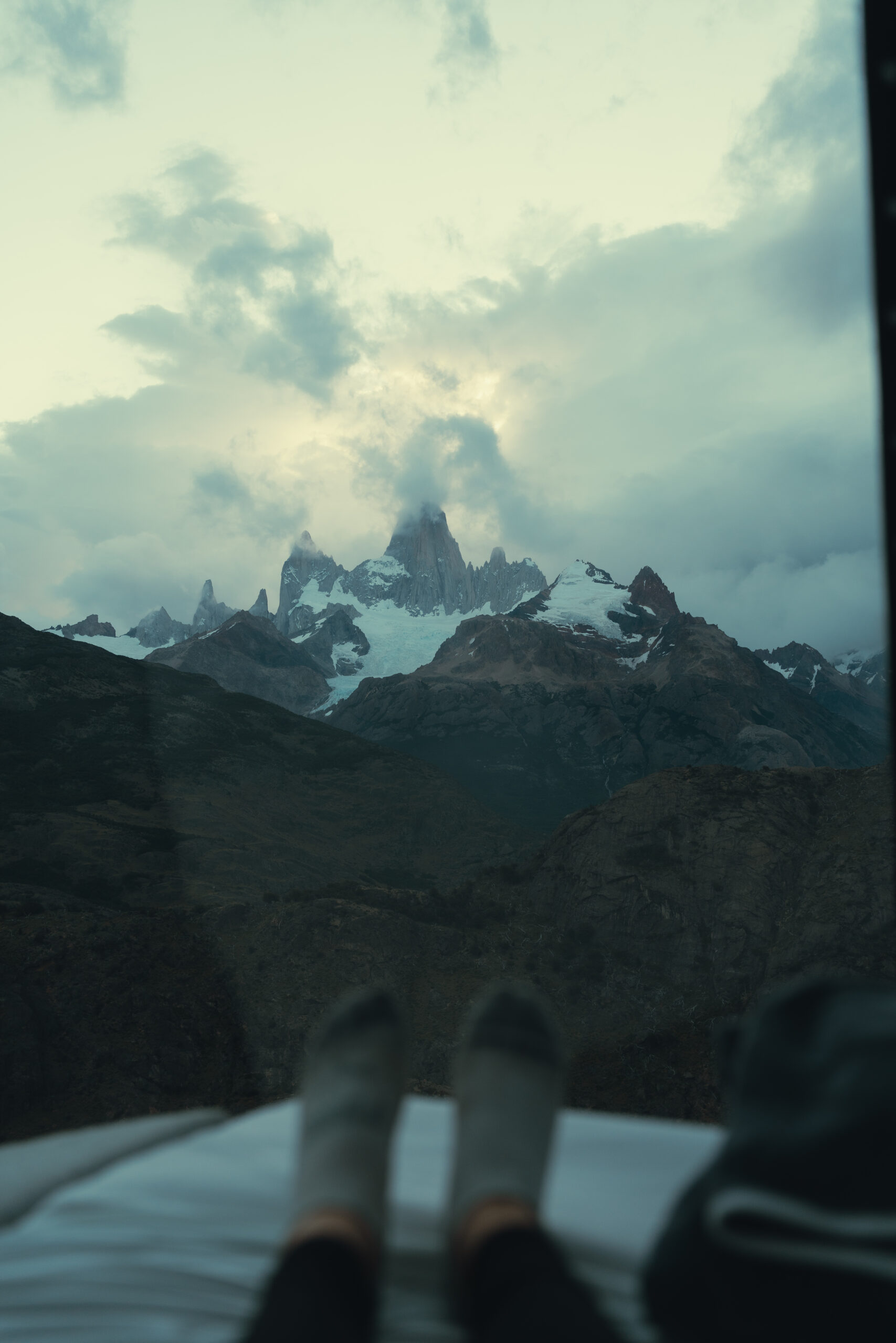 stunning mountains are surrounded by clouds during an unbelievable 2025 Patagonia elopement