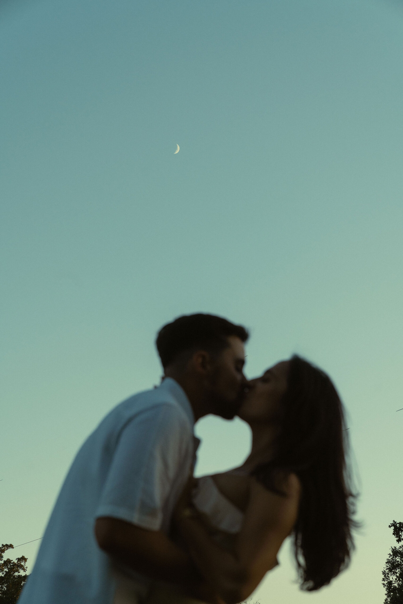 beautiful couple share an intimate moment during their engagement photoshoot with Sasha Takes Pictures