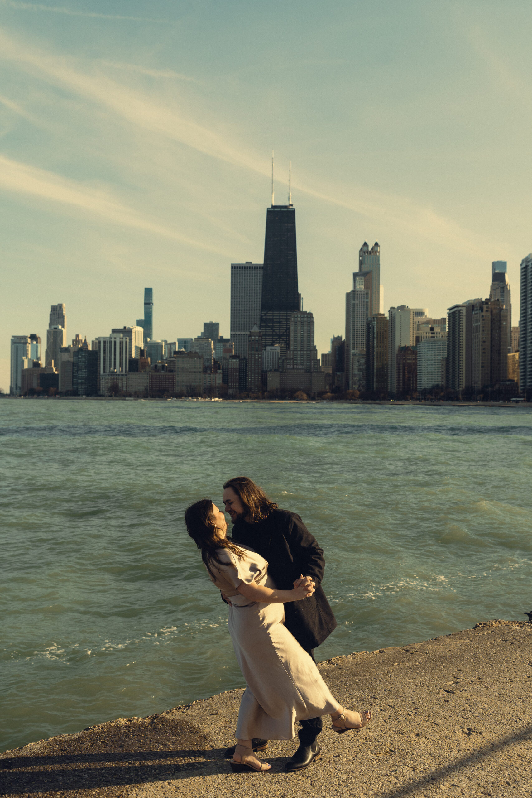 beautiful couple share an intimate moment during their engagement photoshoot with Sasha Takes Pictures