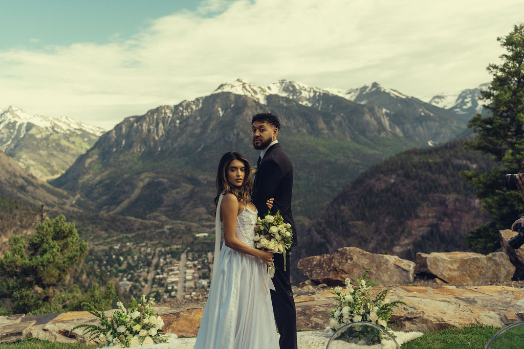stunning bride and groom pose together during their Colorado wedding day