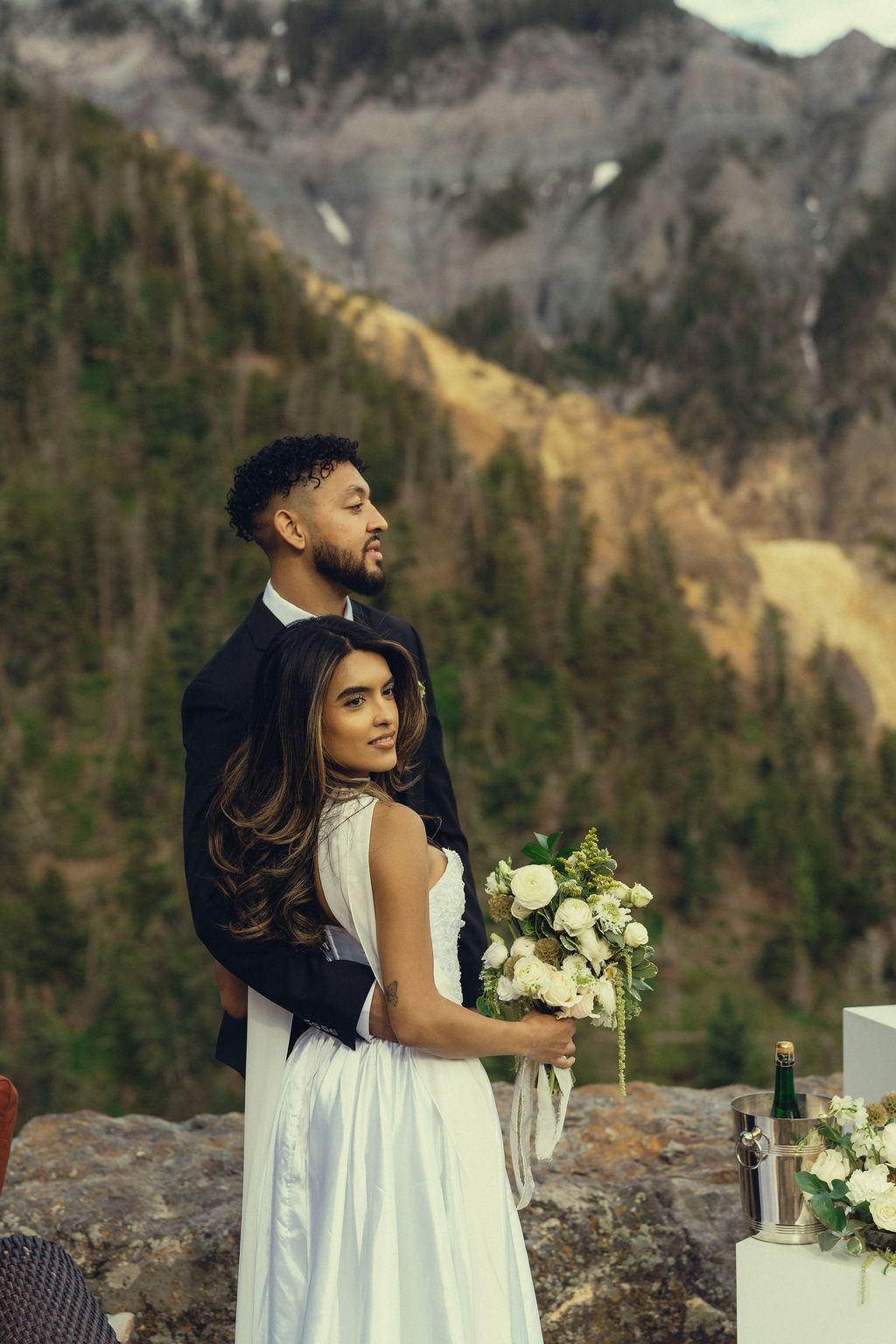 stunning bride and groom pose together during their Colorado wedding day