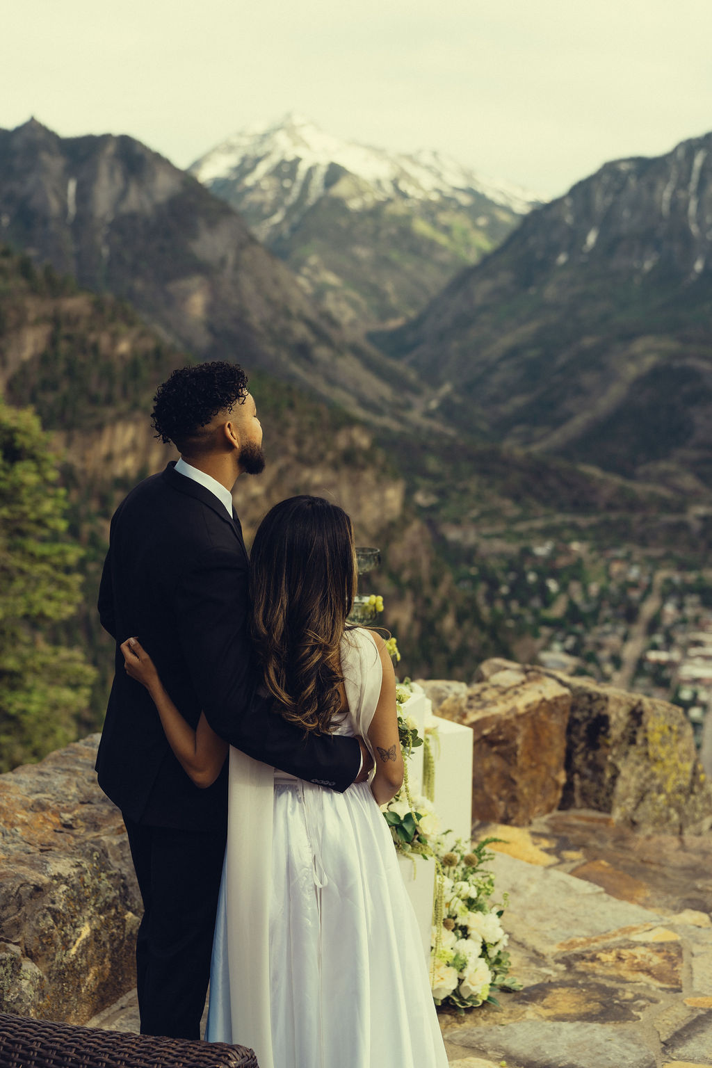 stunning bride and groom pose together during their Colorado wedding day