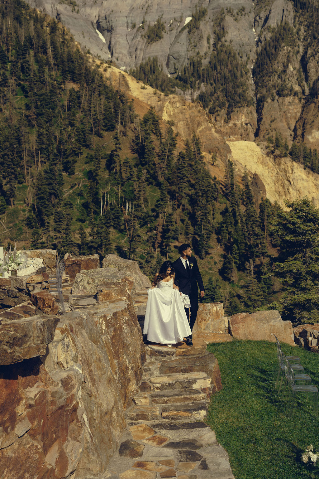 bride and groom look over the stunning Gold Mountain Ranch wedding venue