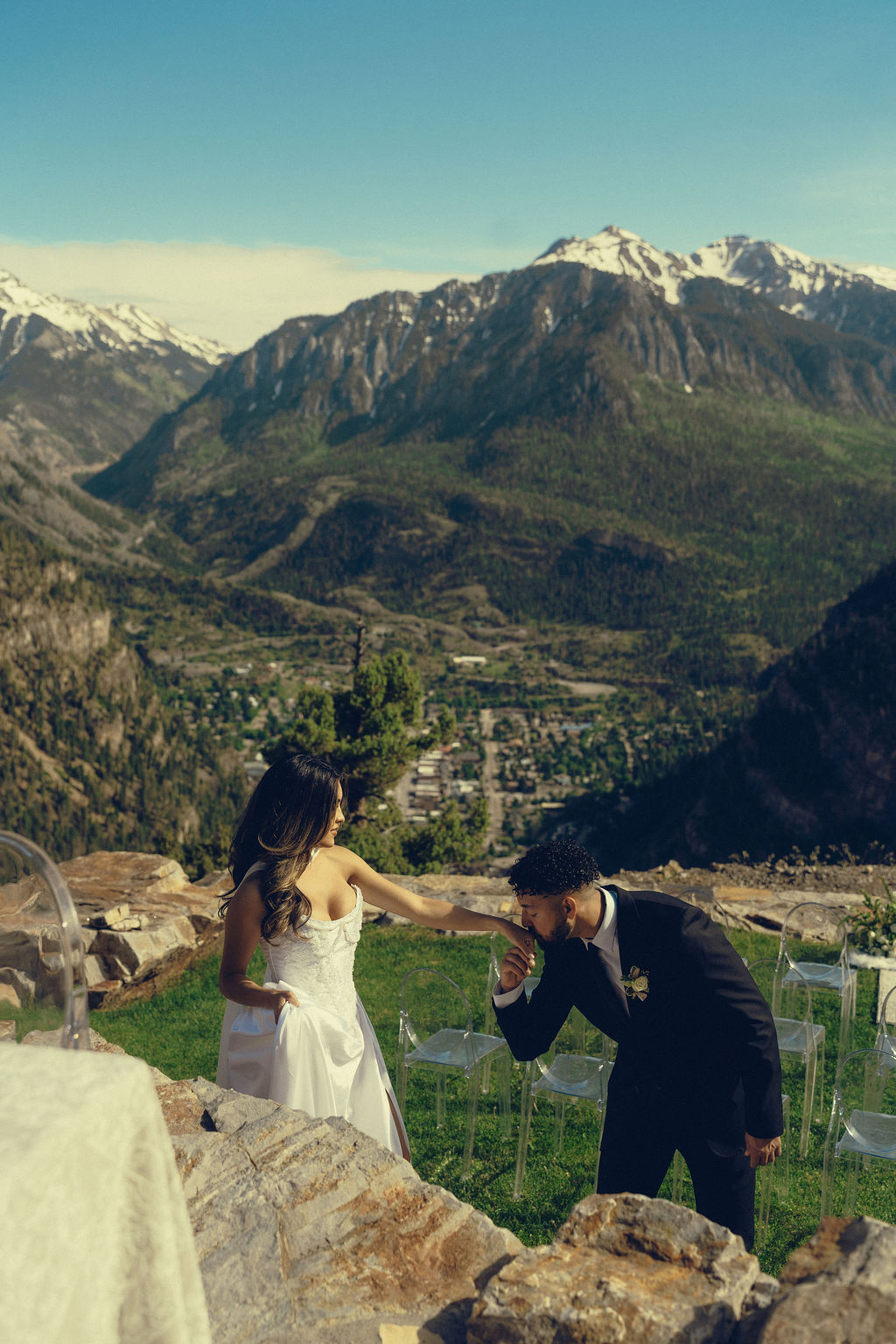 bride and groom share a sweet moment as they prepare for their stunning wedding ceremony