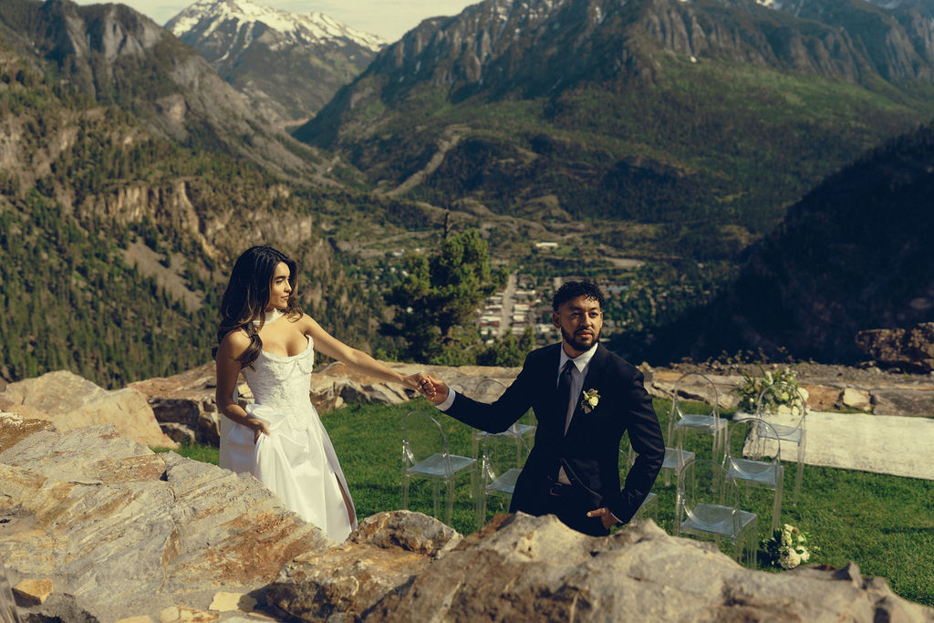 bride and groom share a sweet moment as they prepare for their stunning wedding ceremony