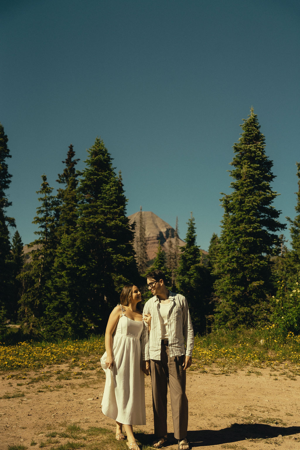 beautiful couple take a moment to share some love during their Durango engagement photos