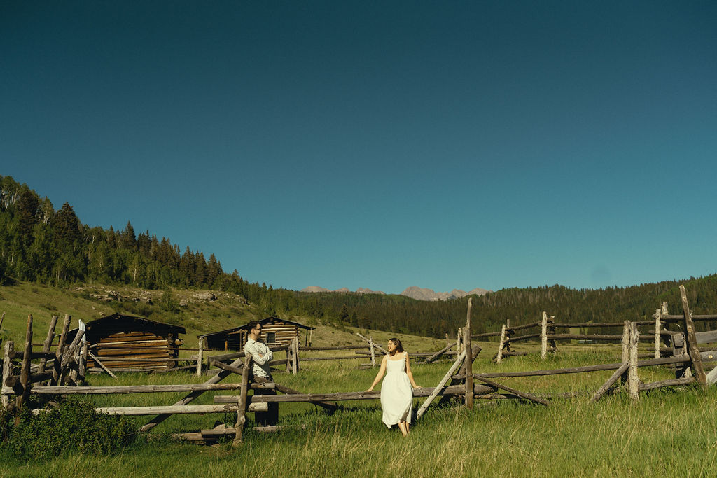 stunning couple pose under the striking Durango, Colorado sky during their engagement photoshoot