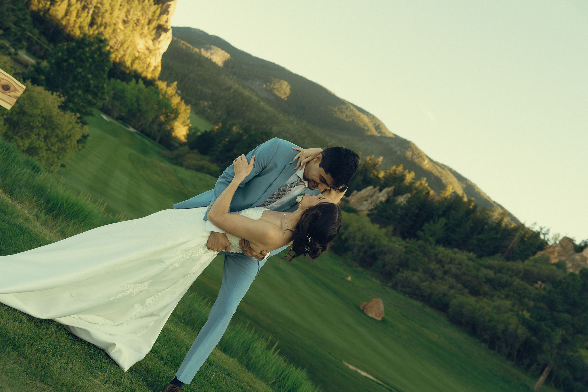 bride and groom share an intimate moment during their Perry Park Country Club wedding day