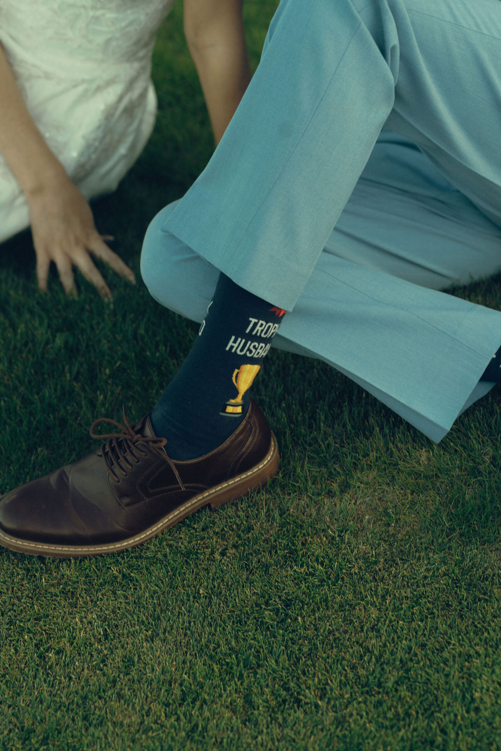 husband shows off his unique socks