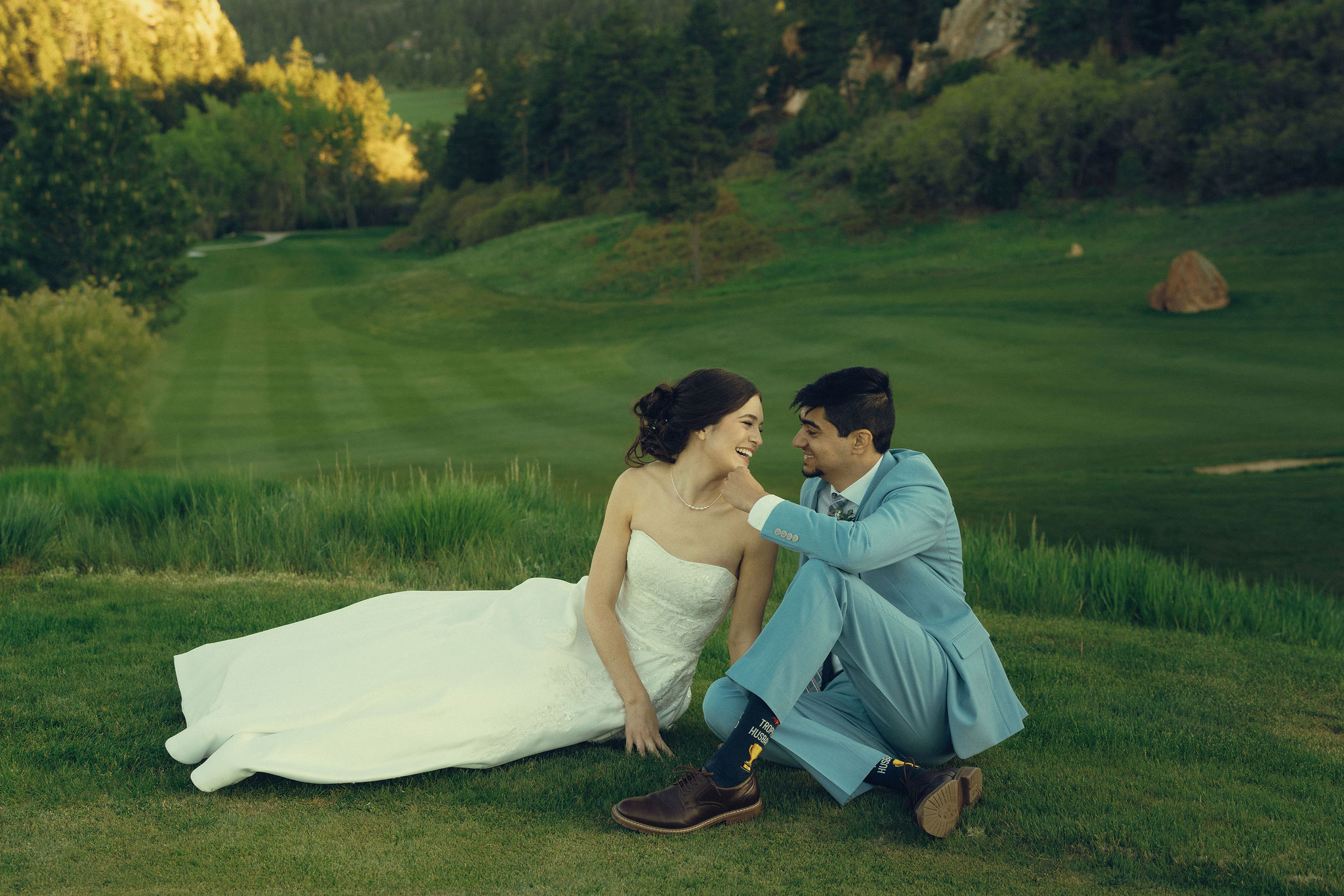 bride and groom share an intimate moment during their Perry Park Country Club wedding