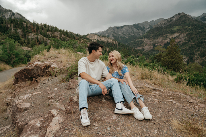 stunning couple share an intimate moment during their mountain engagement photos