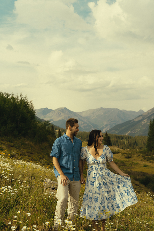 beautiful couple share intimate moments during their Molas engagement session