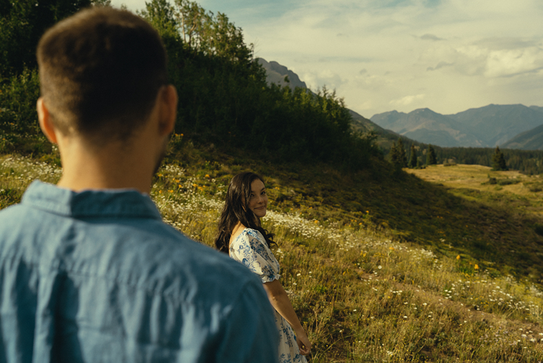 beautiful couple share intimate moments during their Molas engagement session