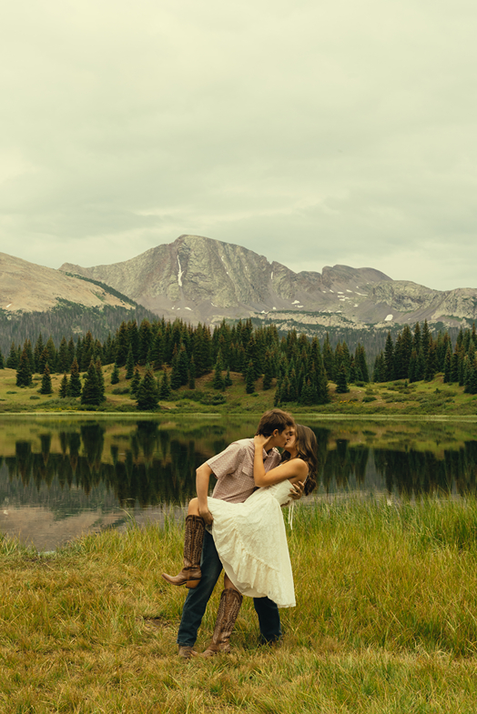 couple share candid moments together during their engagement session
