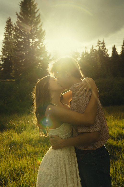 couple share candid moments together during their engagement session