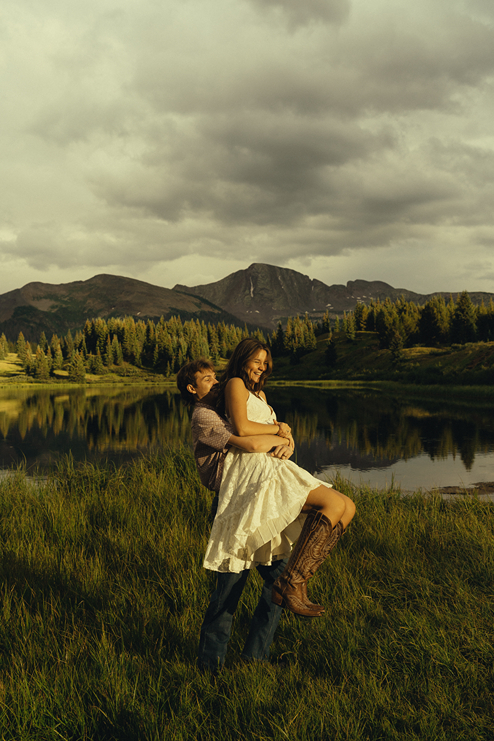 couple share candid moments together during their engagement session