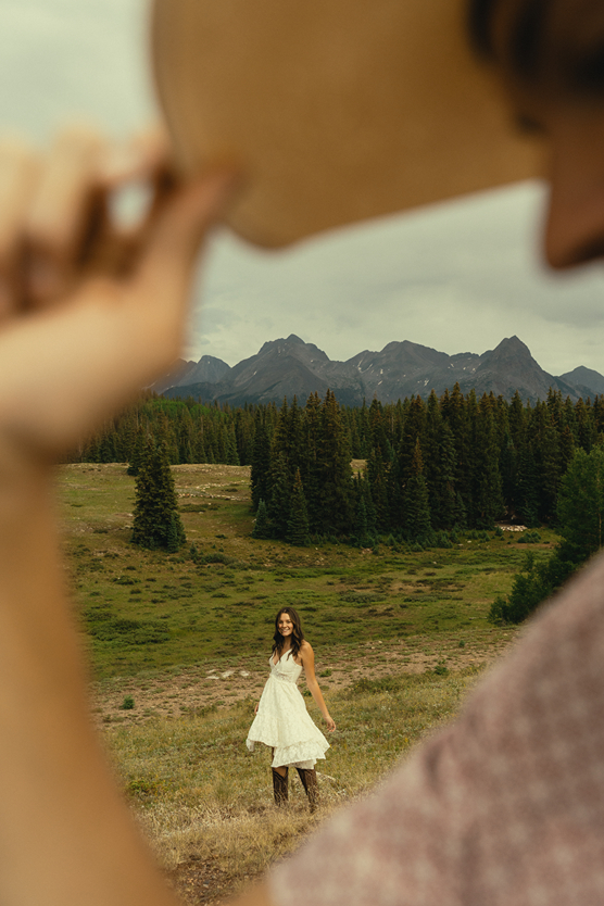 beautiful couple pose in the Colorado nature during their engagement photos