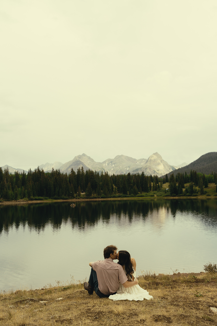 beautiful couple pose in the Colorado nature during their engagement photos