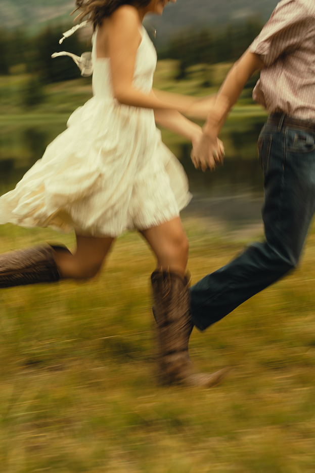 couple run together in the Colorado nature together