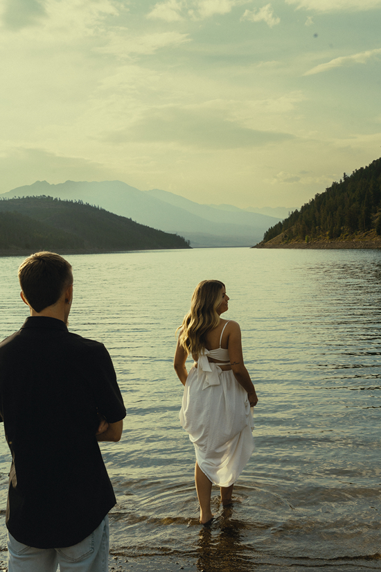 stunning couple pose together near Dillon Lake in Colorado during their Lake Dillon engagement photos