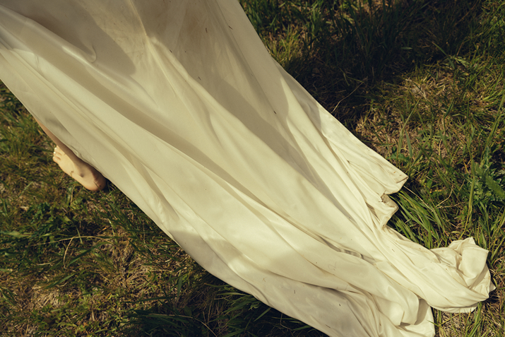 brides dress flows on the ground