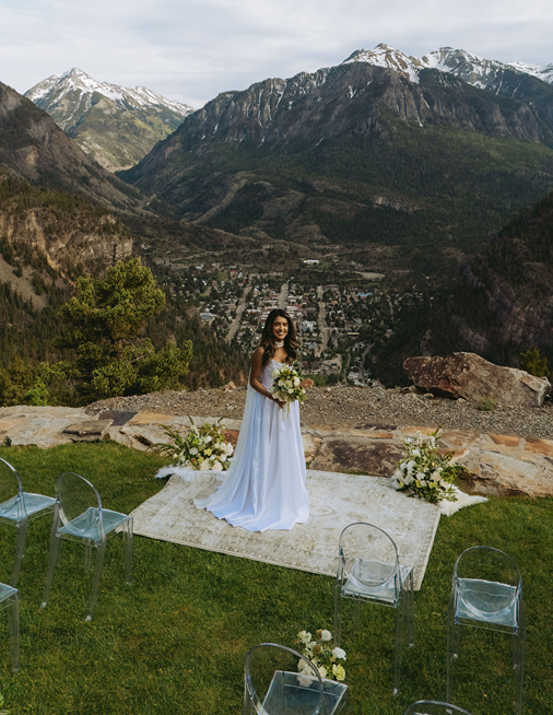 bride poses for a photo captured by a drone